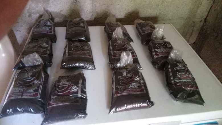 Bags of coffee powder ready for sale on May 16, 2025. Photo by Edxon Francisque for The Haitian Times.