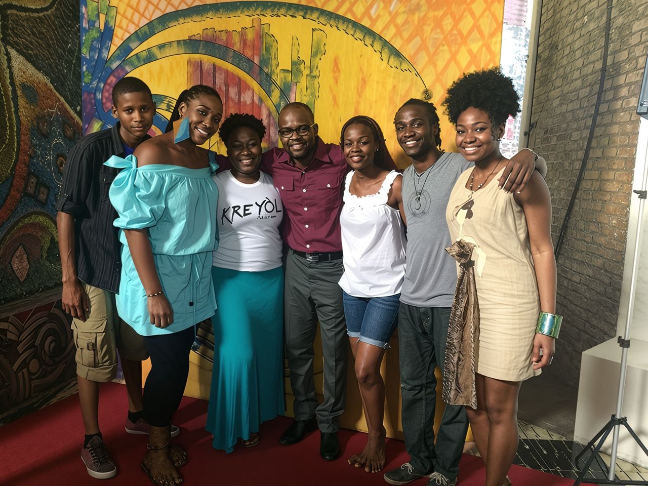 During the filming of the Quinze Minutes Pour Vous show in April 2014, from left to right: Marlon Bélance (Cameraman); Gaëlle Bien-Aimé (Host); Feebe Onaturelle and sin BIC; Pascale Solages (Conceptor and Executive Producer); Réginald Louissaint Junior (Director); Sherlee Skai (Singer). Photo Courtesy of Pascale Solages