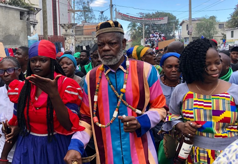 Augustin St. Clou, known as the Vodou King of Haiti, joins the peace march in Port-au-Prince on Saturday, Jan. 3, 2026, alongside Vodou practitioners and Christian leaders who call for change. Photo by Juhakenson Blaise / The Haitian Times
